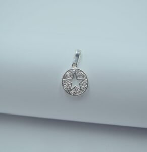 dije círculo con estrella calada 1.7cm